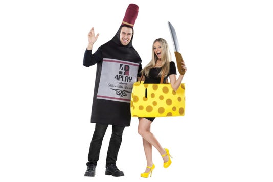 Couple dressed as wine and cheese.